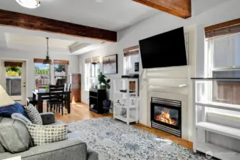 Gas fireplace, tall ceilings, and a open, inviting floorplan.