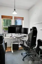 Main floor office with sliding pocket doors.