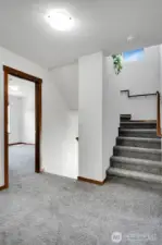 Landing on 2nd floor looking up stairs to 3rd floor.