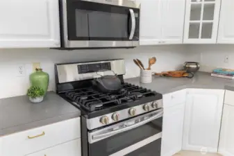 Stainless steel stove and fireplace.