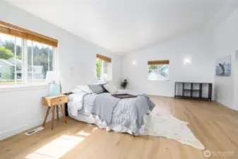 Primary bedroom is large and open to make into your own oasis.