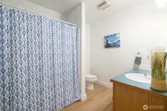 Upstairs includes this second full bathroom.