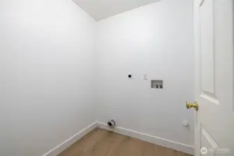 Upstairs washer and dryer room.