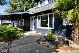 A welcoming front entry with a water feature.