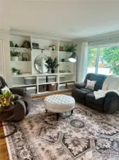 Large window in living room offers lots of natural light.