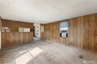 The living area looking into the kitchen