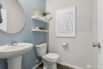 Main floor power room. Actual home is under construction. Colors, materials, and features may vary. See site agent for details.