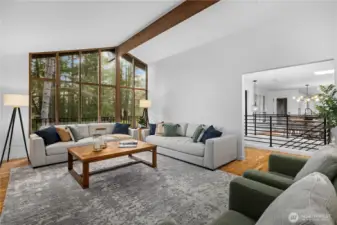 Light-filled gathering space with vaulted ceilings and multiple seating areas—ideal for everyday living and entertaining.