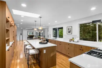 Extensive cabinetry and built-in storage provide functionality while maintaining a clean, modern aesthetic.