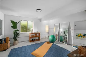 Additional finished lower-level space offers versatility for fitness, yoga, or everyday wellness (no gym membership required).