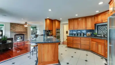 The kitchen is perfect for entertaining, large enough to stay together.  All the appliances are newer and top of the line quality, the counters are granite as well as the full height backsplash.  The floors are a wonderful tile with diamonds of granite inlayed.