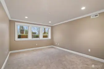 Lower level guest bedroom with ensuite bath