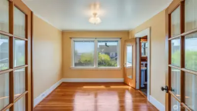 Upstairs: French doors to primary bedroom.