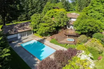 Resort like amenities, pool with pool house and shower bath. Potential cabana/guest house!