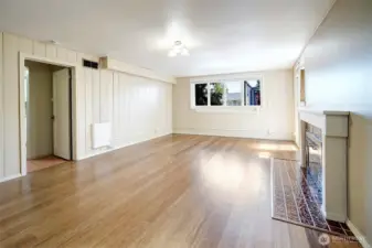 This view of the Family Room shows the door leading to the lower level kitchen.