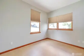 Guest bedroom could also function as a private office space or den room.