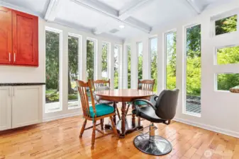 Thoughful built-ins and lots of windows make this space attractive, comfortable and functional.