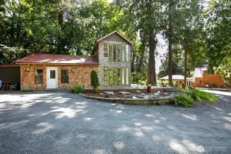 Enjoy the wrap around deck, landscape w water feature, mature forest, babbling brook and so much more!