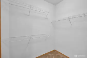 Primary bedroom walk-in closet.