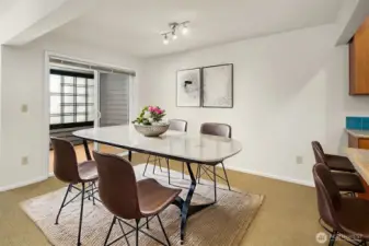 Virtually staged dining area. Large enough for a big gathering.