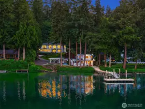 Waterfront retreat and compound with deep-water dock on the sheltered shore of Manzanita Bay.