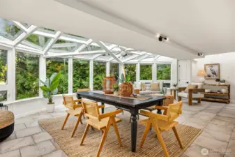 Absolutely amazing! Outside you will find a covered hot tub adjacent to the south side of this sunroom.