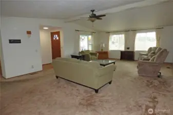 Another view of the large living room. Notice the stereo system on the wall.