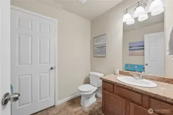 Spacious First Floor Bathroom with Large Storage Closet