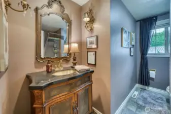 The beautiful vanity in the guest bathroom, very classy.