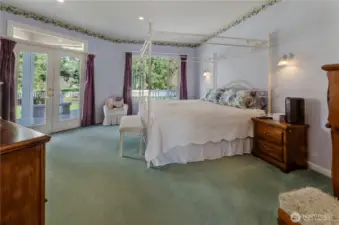 French doors lead right out to your wrap-around porch and hot tub