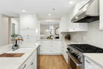 Wait until you see the quality workmanship here! Note the pass-through to the dining room. What you can't see in this photo is the under-counter Scotsman ice maker to the left of the sink. Won't that come in handy?