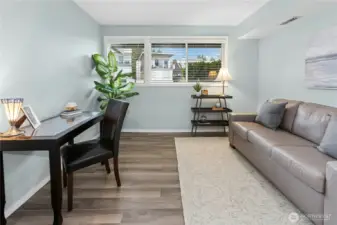 The third bedroom on the lower level has tile floor, fresh paint and a reach-in closet. Bedroom is currently staged as an office. How would you use this space?