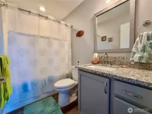Full bathroom off of the hallway.
