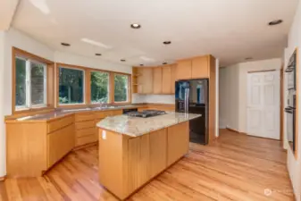 Light and Bright Kitchen . The Stairs to the Bonus Room are Behind the Refrigerator