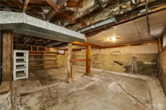 This basement offers good ceiling height. A perimeter drain is present.