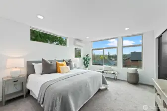 Large primary suite with ductless heating and AC.