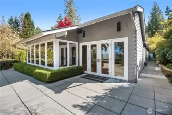 Bask in the beauty of west-facing Lake Washington views as natural light floods the space, creating a serene and tranquil atmosphere that enhances this exceptional setting.