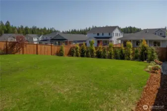 Extended retaining walls enhance drainage and add striking visual appeal to both front and back yard