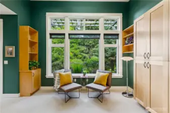 The primary bedroom has a studio attached. Room for quilting, projects or seclusion off the main bedroom.