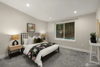 Secondary bedroom on the main floor with an ensuite.