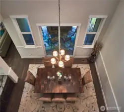 The dining room opens to a private covered patio with its own gas fireplace - a 4-season outdoor space!