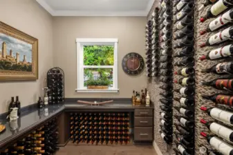 The wine room with a custom built "wine-wall" is a must for the wine enthusiast!