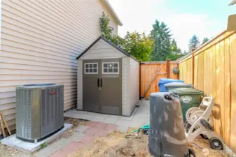 New heat pump & shed for addiitional storage.