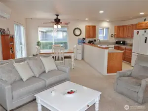 The Living Room opens into the Dining Area and Kitchen.