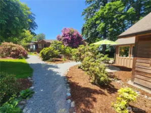 Path leading to the main house. Guest house on the right.