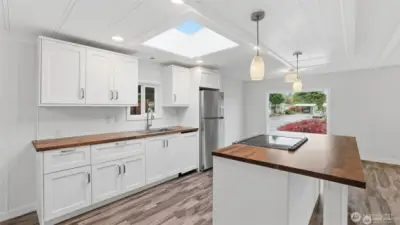 New kitchen with Butcher Block counters and large skylight
