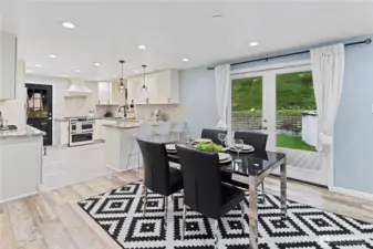 French doors open to the massive trex deck/pool/bbq - makes for great entertaining!