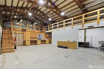 This is the inside of the shop - LOTS of room for anything!  The little window looks into the ADU space.