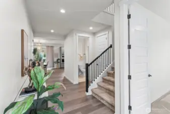 Entryway with both a mainfloor bedroom and bathroom.
