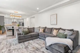 Open concept living, dining and kitchen flows beautifully